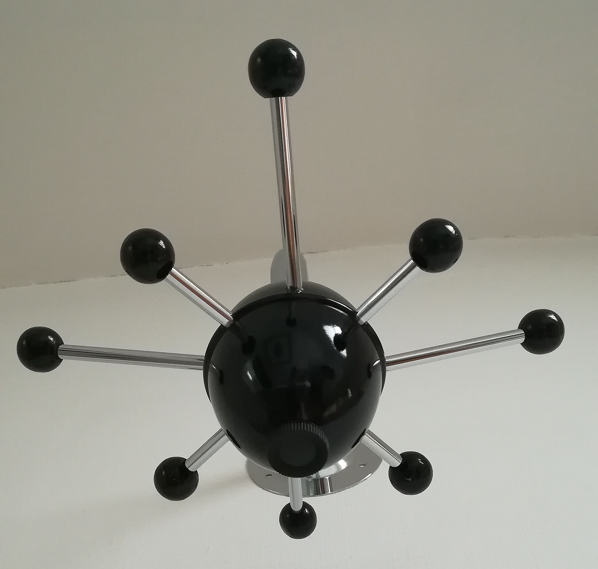 Black Sputnik coat rack and chrome 80s design
