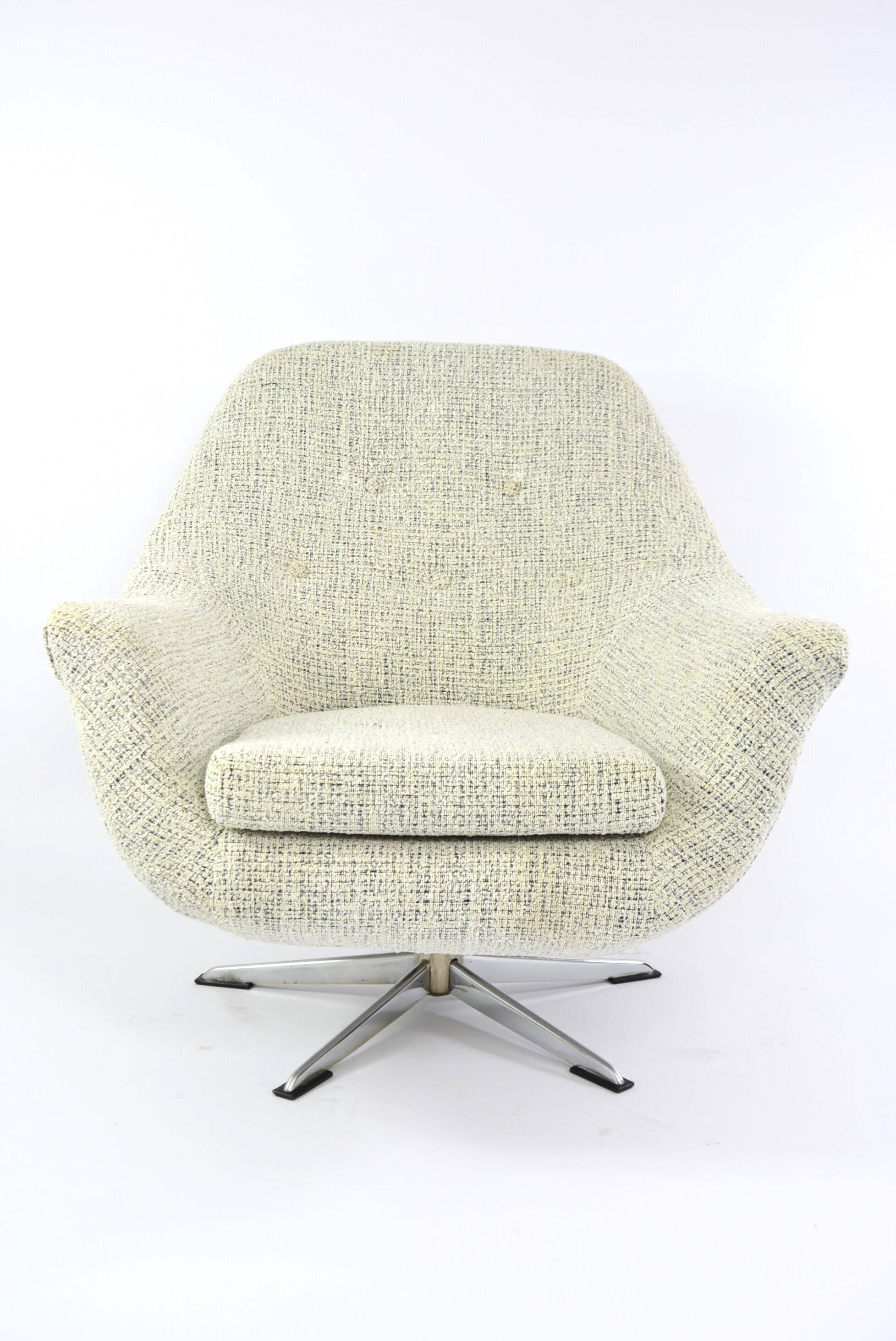 Swivel shell armchair