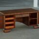 Art Deco desk, sculptural and expressive, in walnut, made by a French cabinetmaker, 1930s.