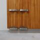 Modernist wall-mounted cloakroom in teak