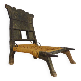 Traditional Pidha chair in carved wood. Early twentieth century