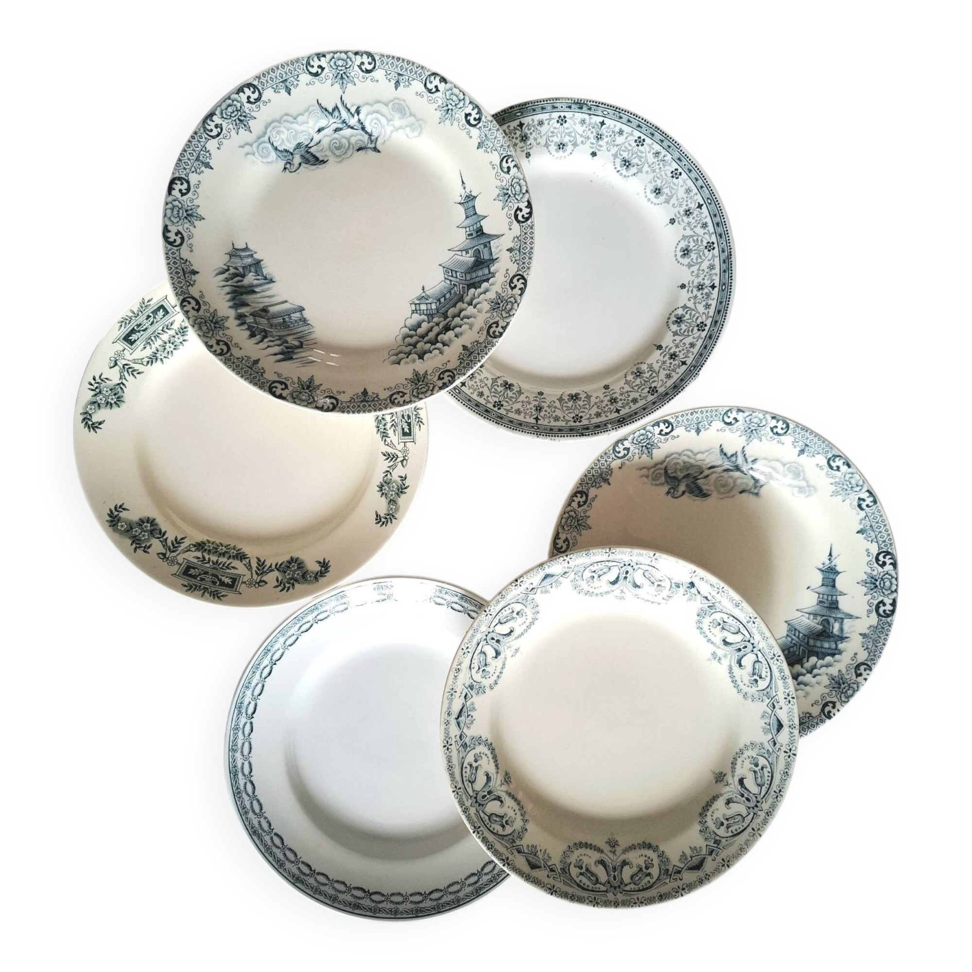 Mismatched antique ironstone dinner plates