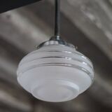 Art Deco pendant light, chrome metal suspension and glass globe, ceiling lamp.