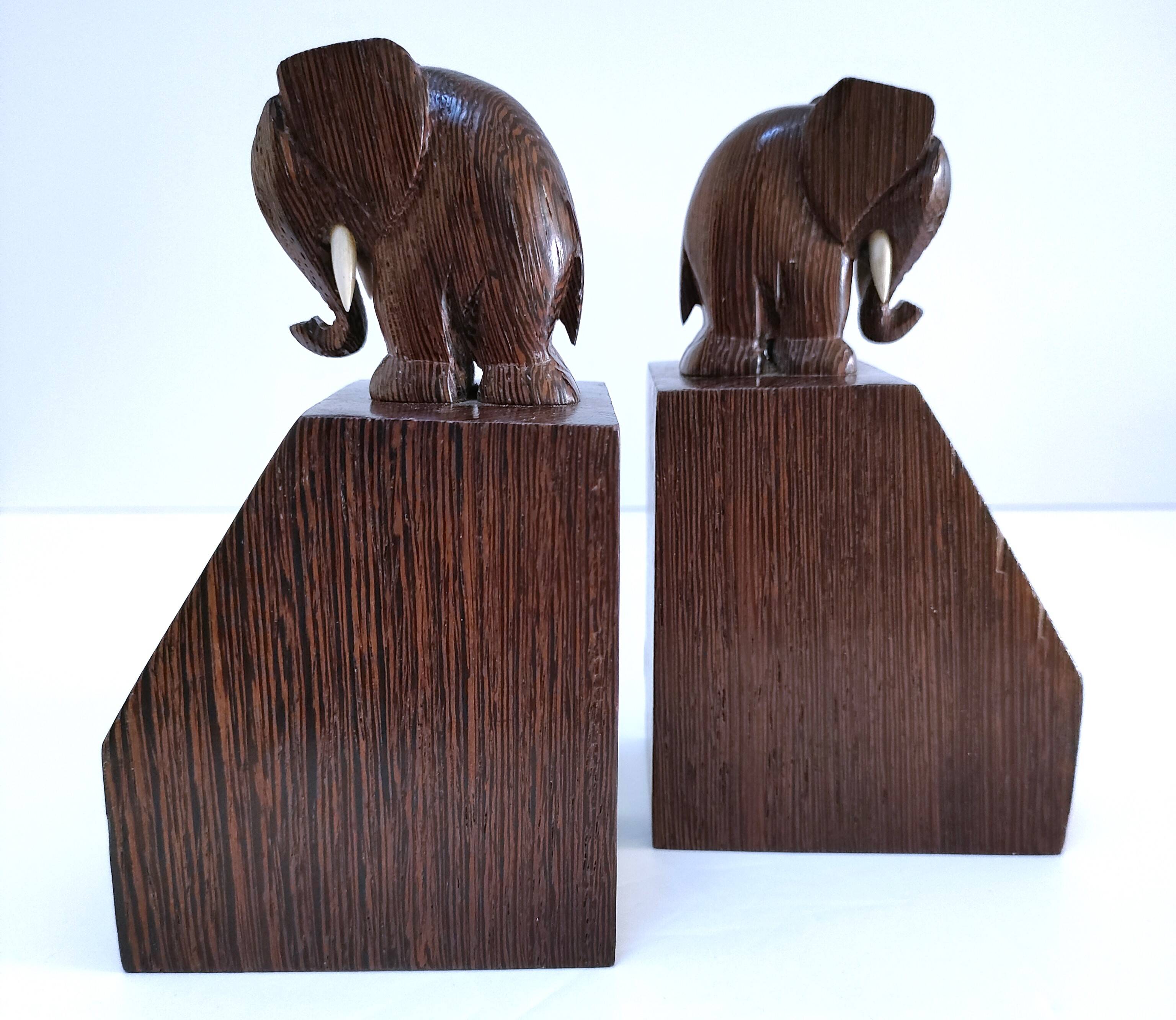 Pair of stylized elephant bookends in solid wood