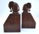 Pair of stylized elephant bookends in solid wood