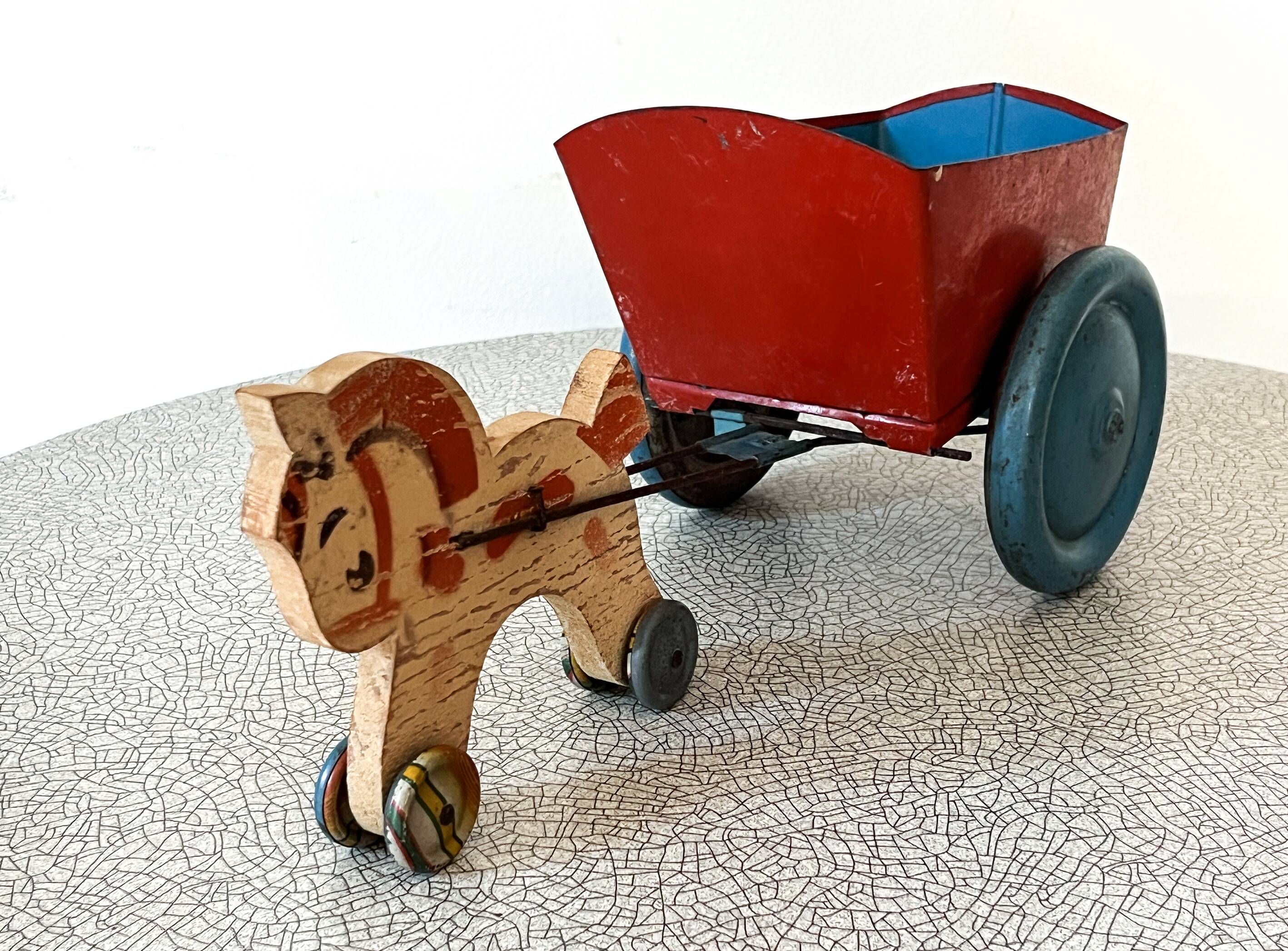 Horse cart and tin cart, old pull toy.