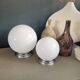 Pair of ceiling lights or wall lights with white glass globes.