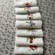 7 antique and embroidered napkins