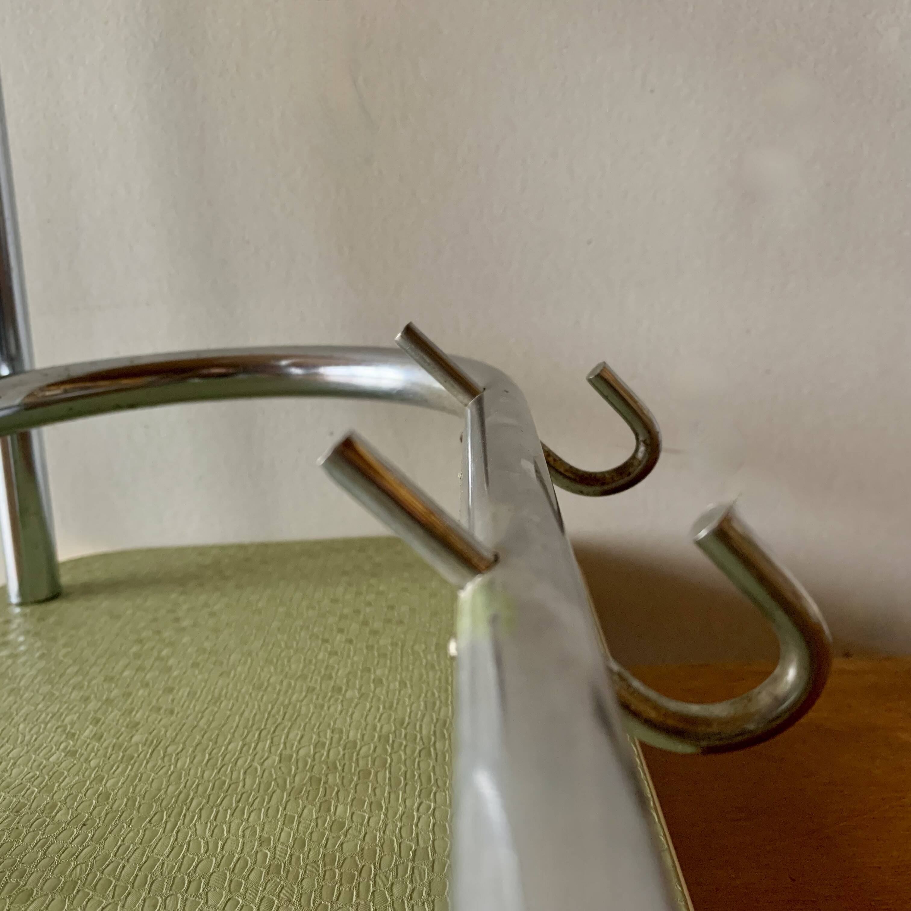 Large vintage wall-mounted coat rack in green Formica and chrome metal