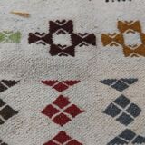Handmade rugs in natural wool with traditional patterns