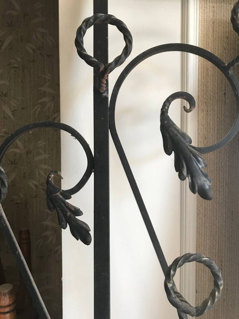 Wrought iron coat rack and shelf
