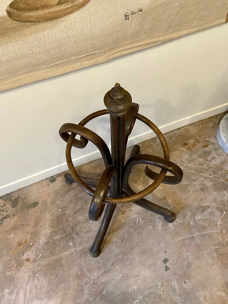 Umbrella holder in arched and dark wood