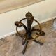 Umbrella holder in arched and dark wood