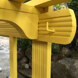Yellow vintage coat holder