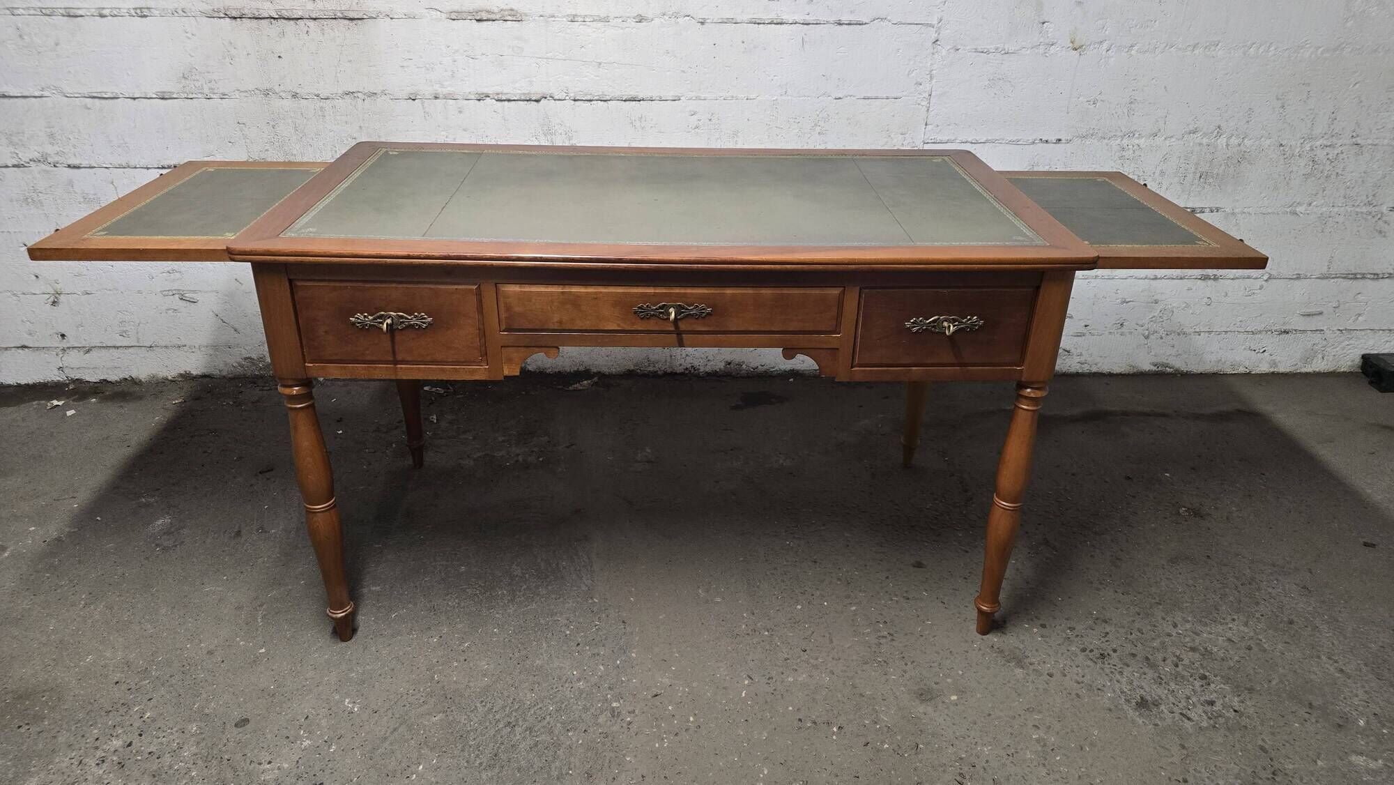 Flat leather desk, Louis-Philippe style, side pull-outs.