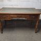 Flat leather desk, Louis-Philippe style, side pull-outs.