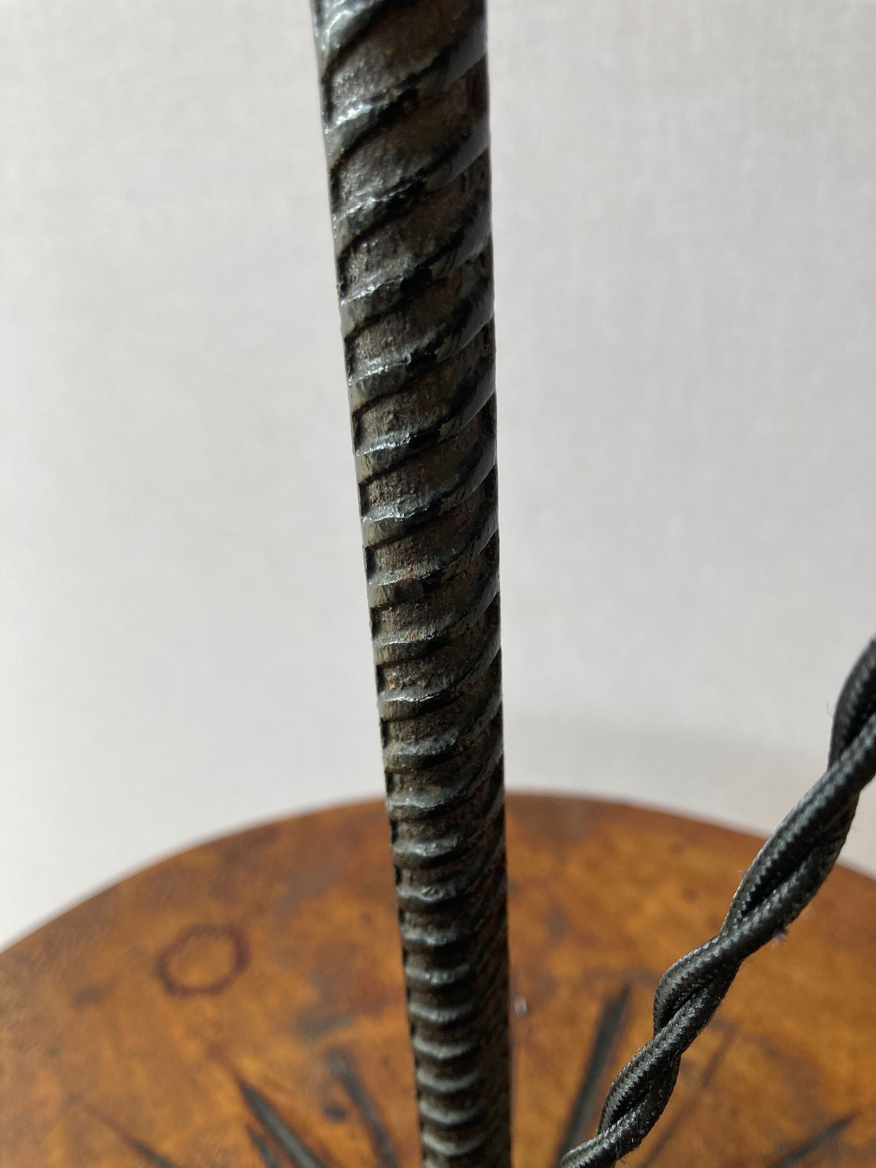 Wrought iron floor lamp with magazine holder and sisal shade, 1950s