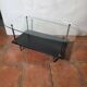 Vintage coffee table from the 1960s, glass, faux leather, brass.