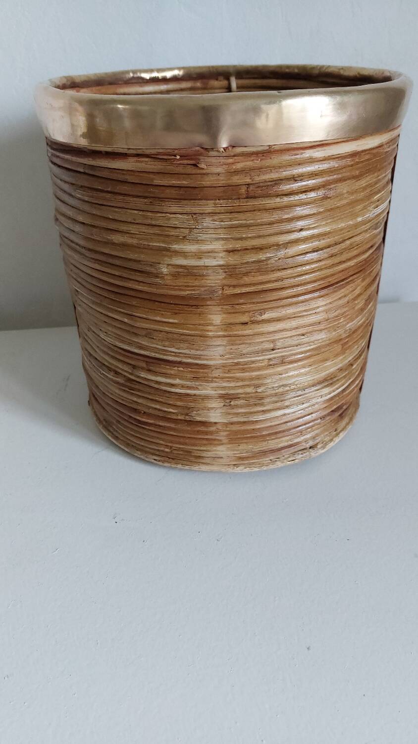 Rattan and brass pot cover