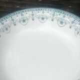 Large round ironstone serving dish from the Moulin des Loup earthenware factory