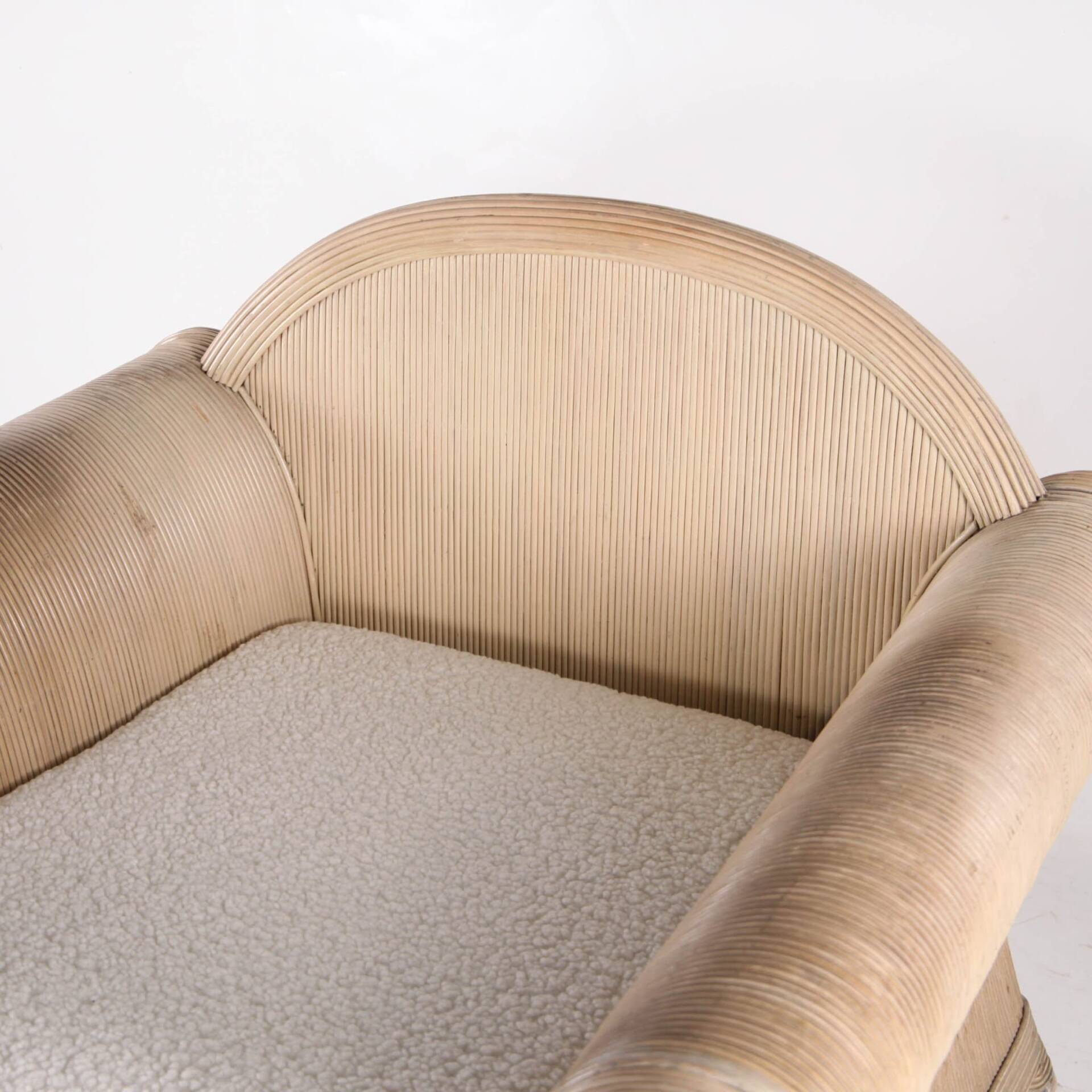 Rattan armchair by Betty Cobonpue