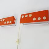 Pair of Scandinavian wall sconces with swivel shade in orange metal. 70