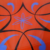 Plant holder tripod in geometrically patterned orange formica