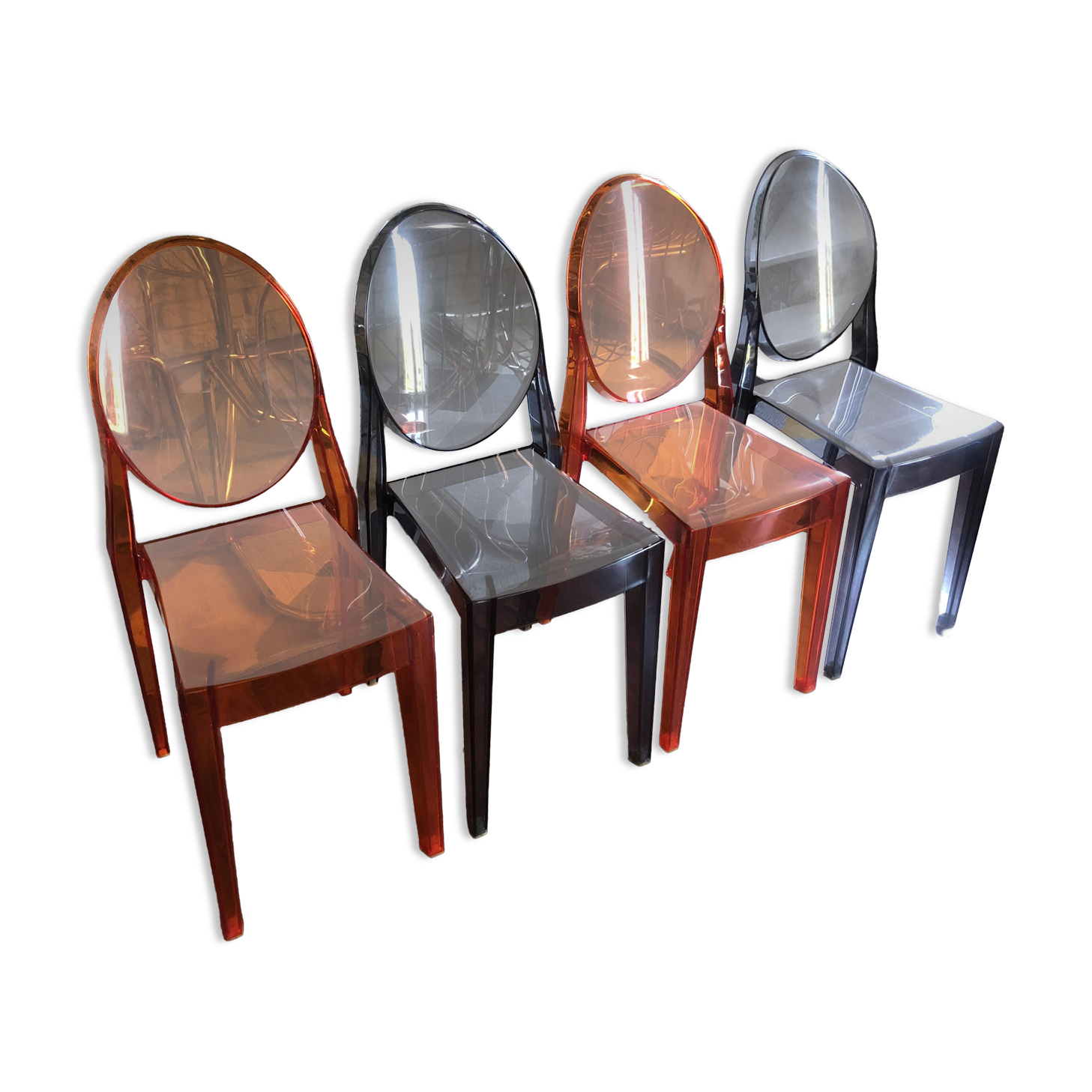 Lot of 4 Philippe Starck Victoria Ghost chairs.