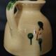Vintage glazed terracotta ceramic jug from the 20th century.