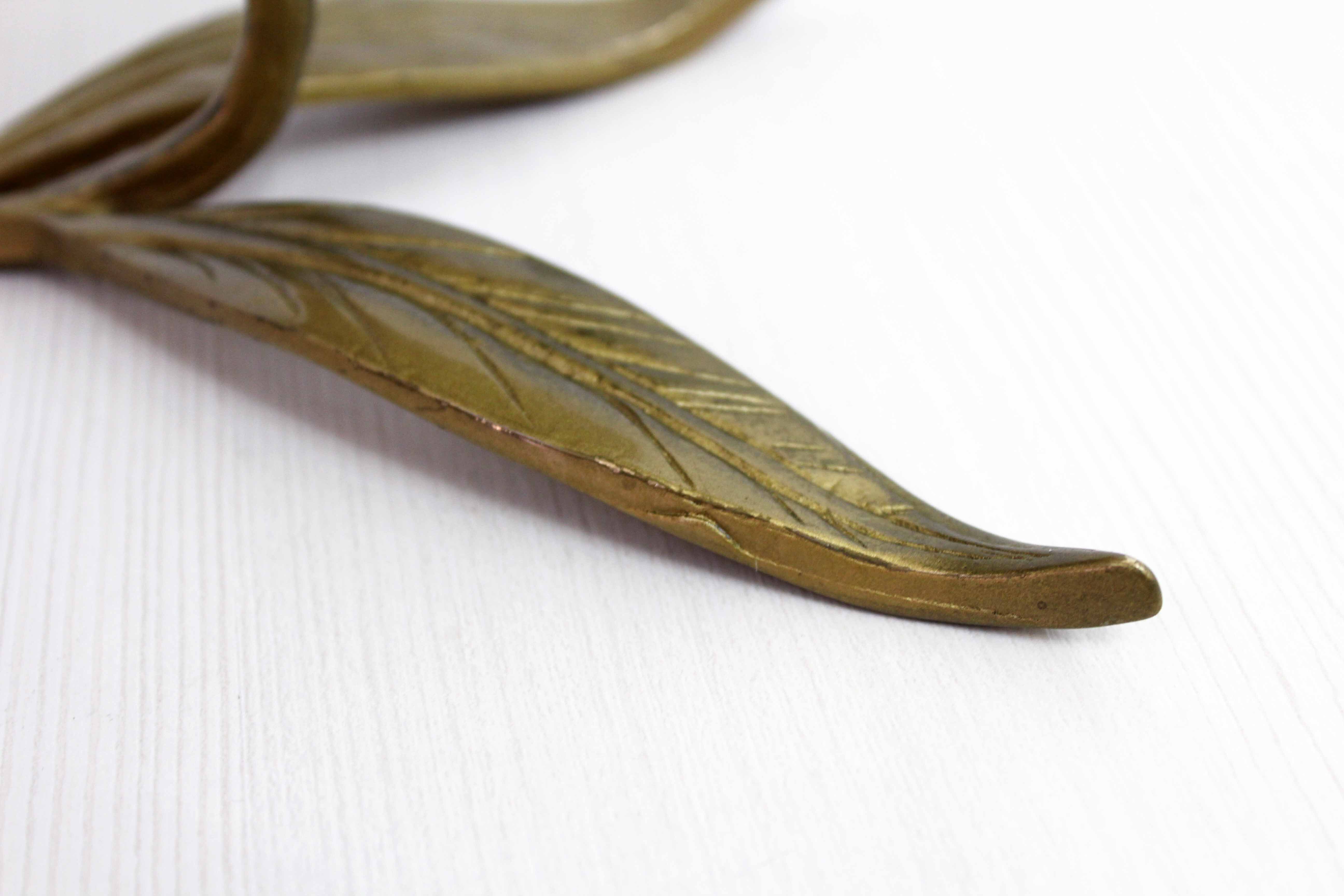 Brass flower candle holder