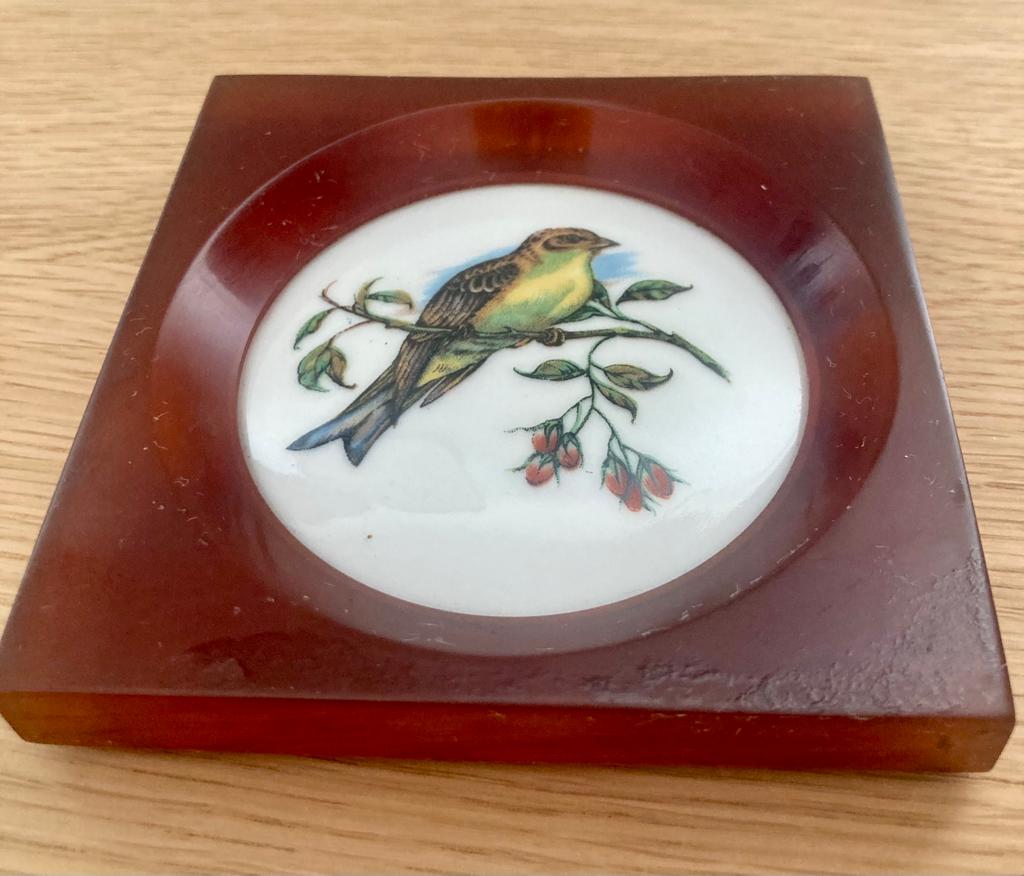 Porcelain and bakelite frame