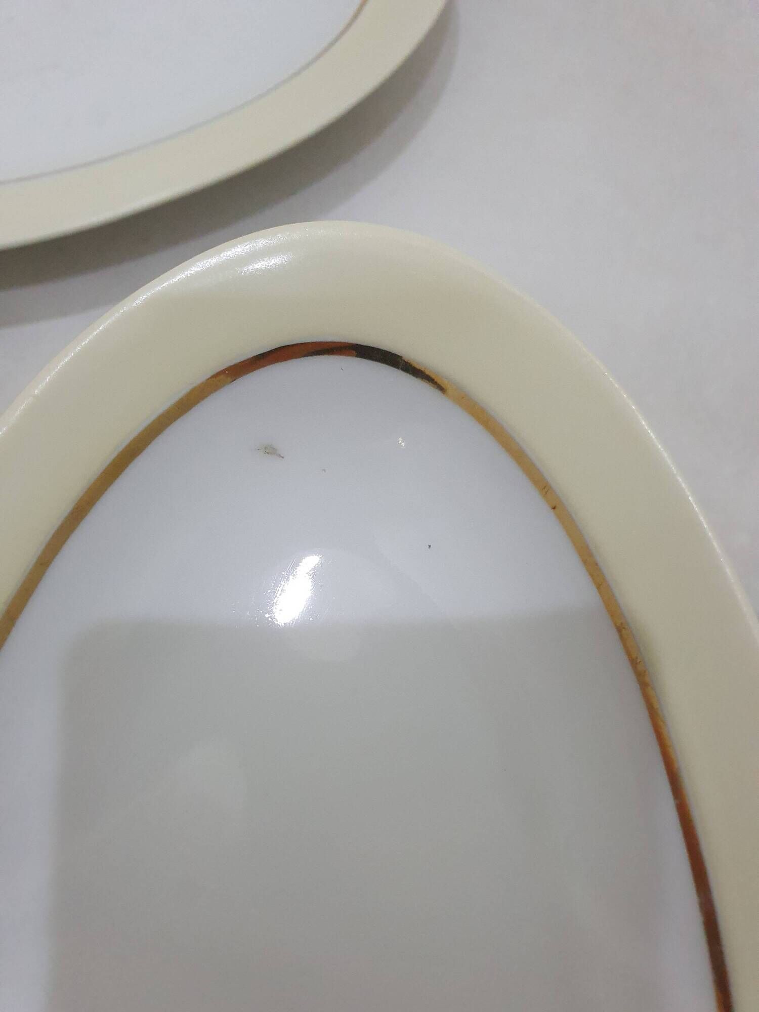White and yellow porcelain dinner service with gold edging, Poral Limoges France