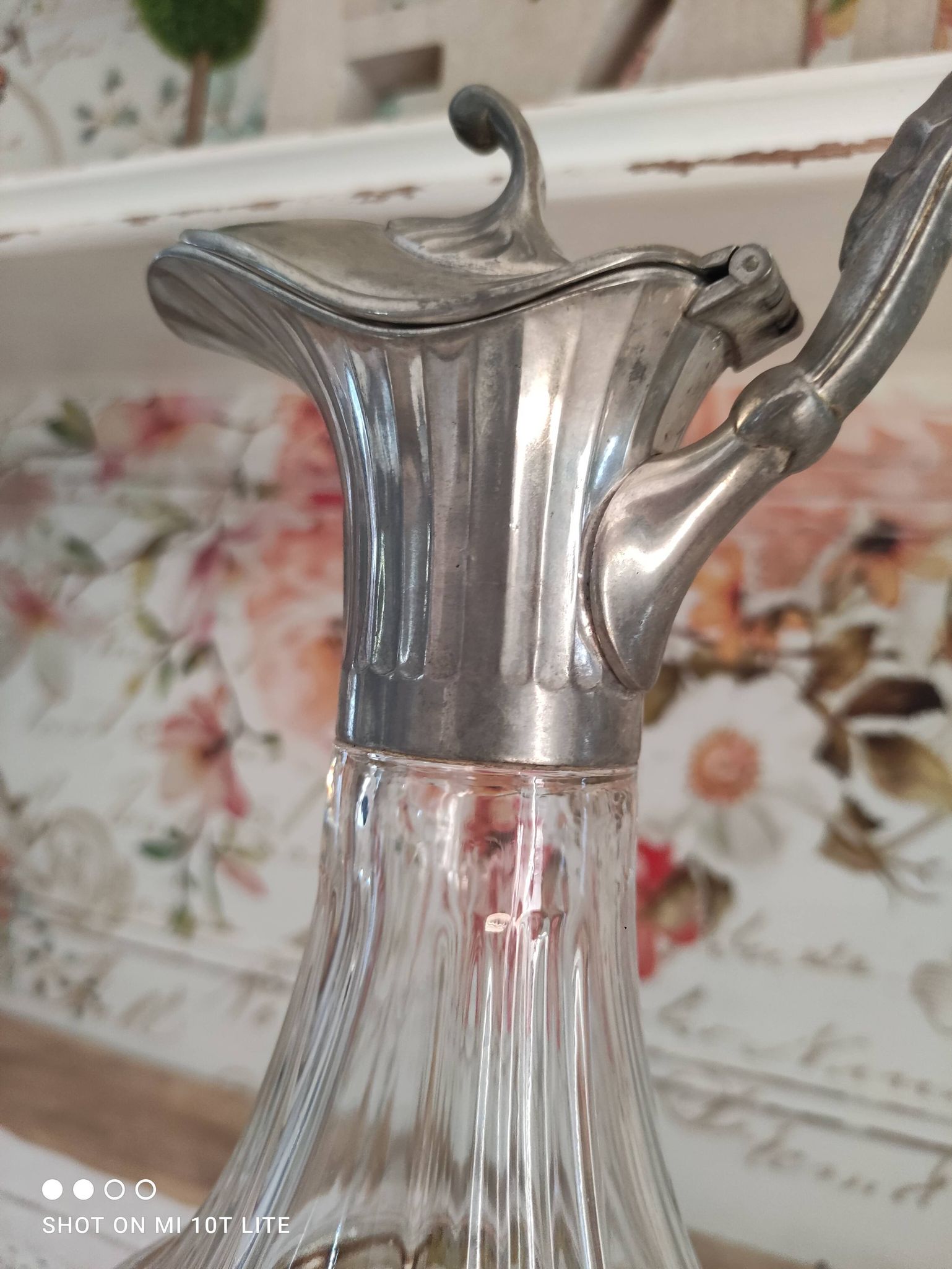 Old water decanter in curved glass and tin Art Nouveau style