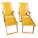 2 vintage Chilean deck chairs made of wood and yellow fabric printed with sailboats, with footrests.
