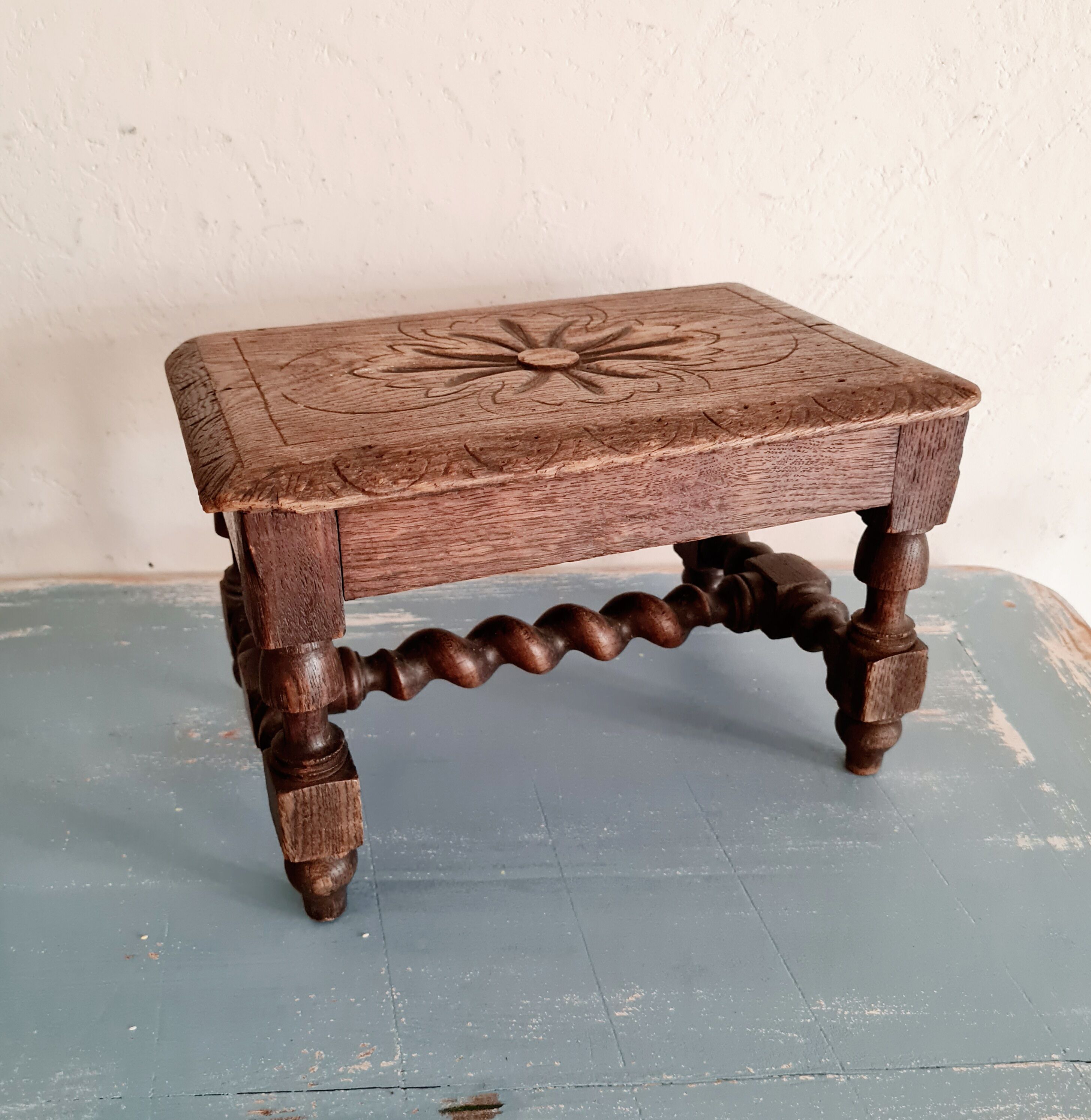 Small old carved wooden bench