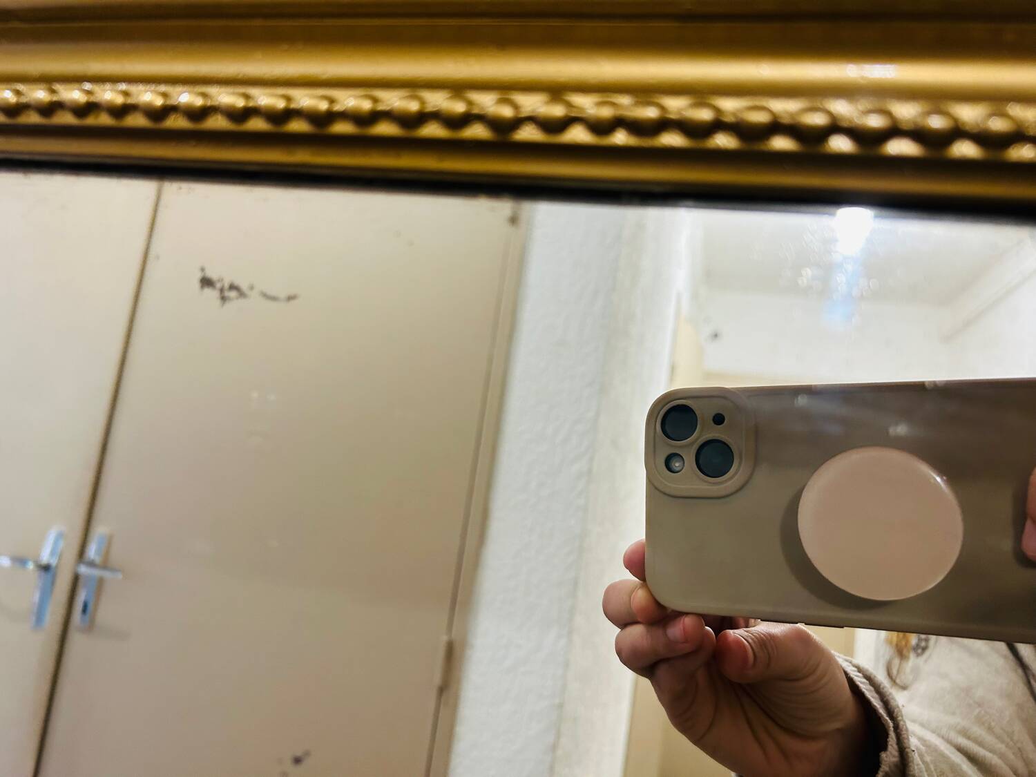 Antique gilded mirror in old Louis Philippe wood