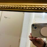 Antique gilded mirror in old Louis Philippe wood