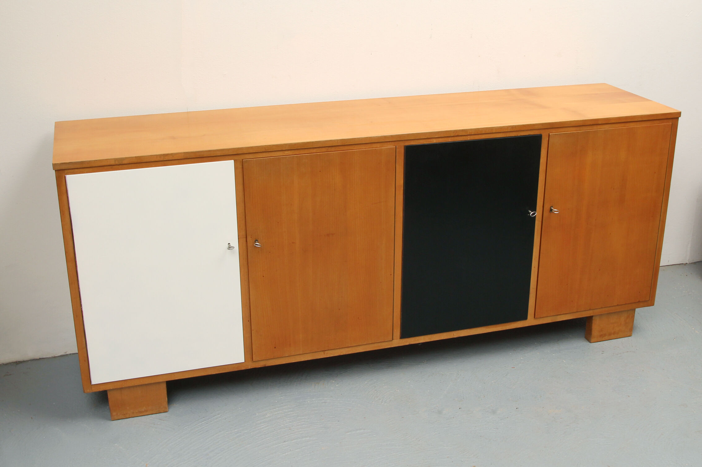 Sideboard in cherrywood with black and white doors 1950s