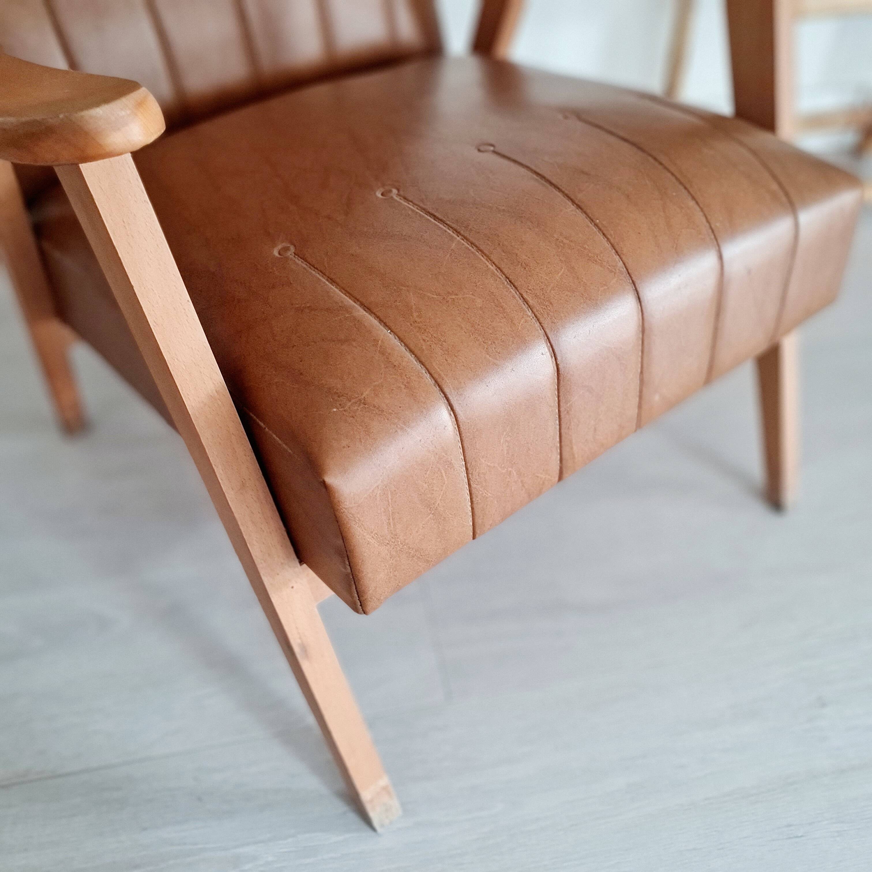 Scandinavian armchair with camel compass legs