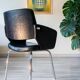 Modernist armchair from the 50s-60s, chrome and faux leather.