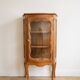 Small silver display cabinet in Louis XV style made of wood.