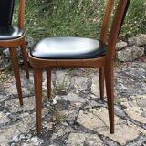 Four vintage beech and skai chairs
