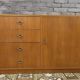 Vintage 1960s furniture with 4 drawers and 1 door.