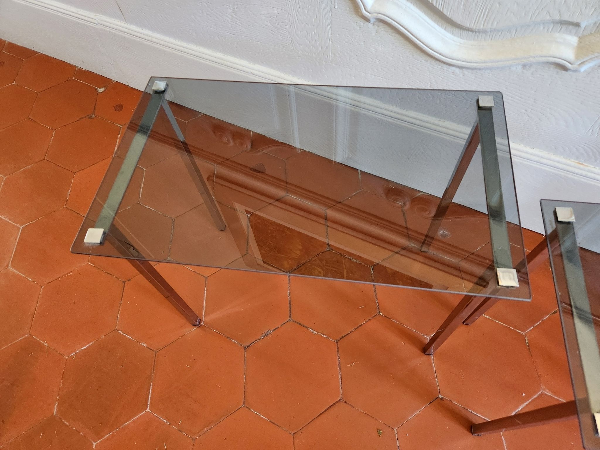 3 nesting tables from the 1970s in smoked glass.