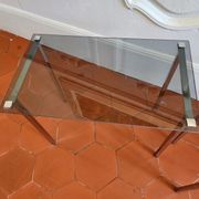 3 nesting tables from the 1970s in smoked glass.