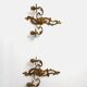 Pair of Rococo wall sconces in gilded bronze, Hollywood Regency, from the years.
