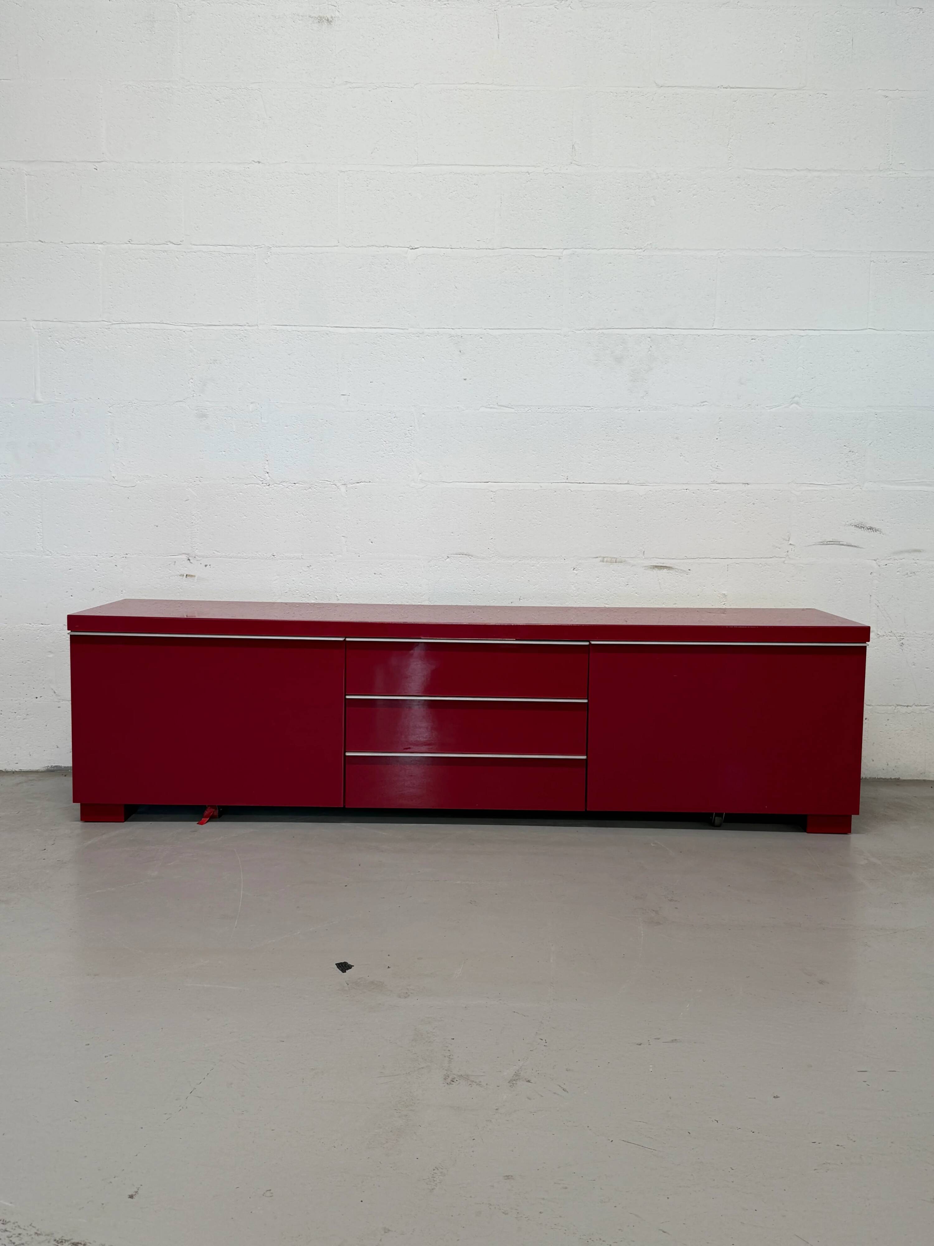Glossy red semi-vintage lacquered IKEA sideboard with drawers