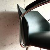 Vintage green faux leather and chrome armchair