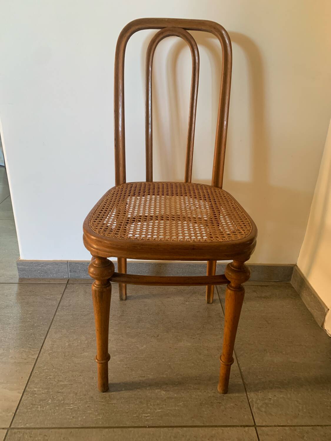 Set of three caned chairs by Jacob & Josef Kohn.