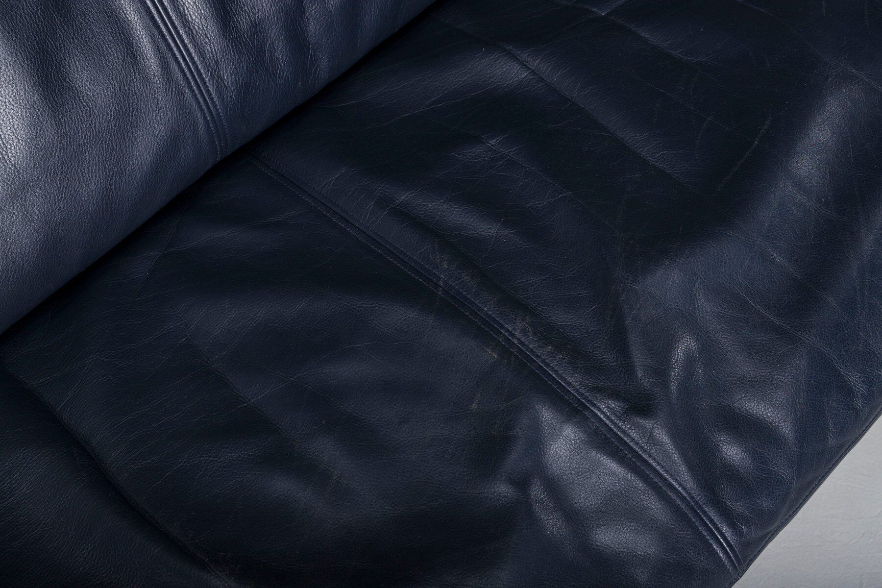 Danish teak and navy blue leather 3-seater sofa from Komfort, 1970s